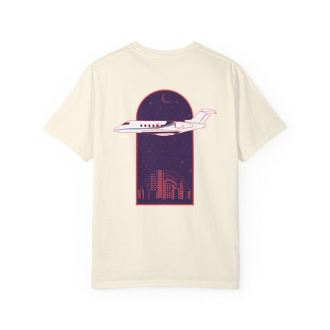 Beige t-shirt with a graphic of an airplane on a night sky